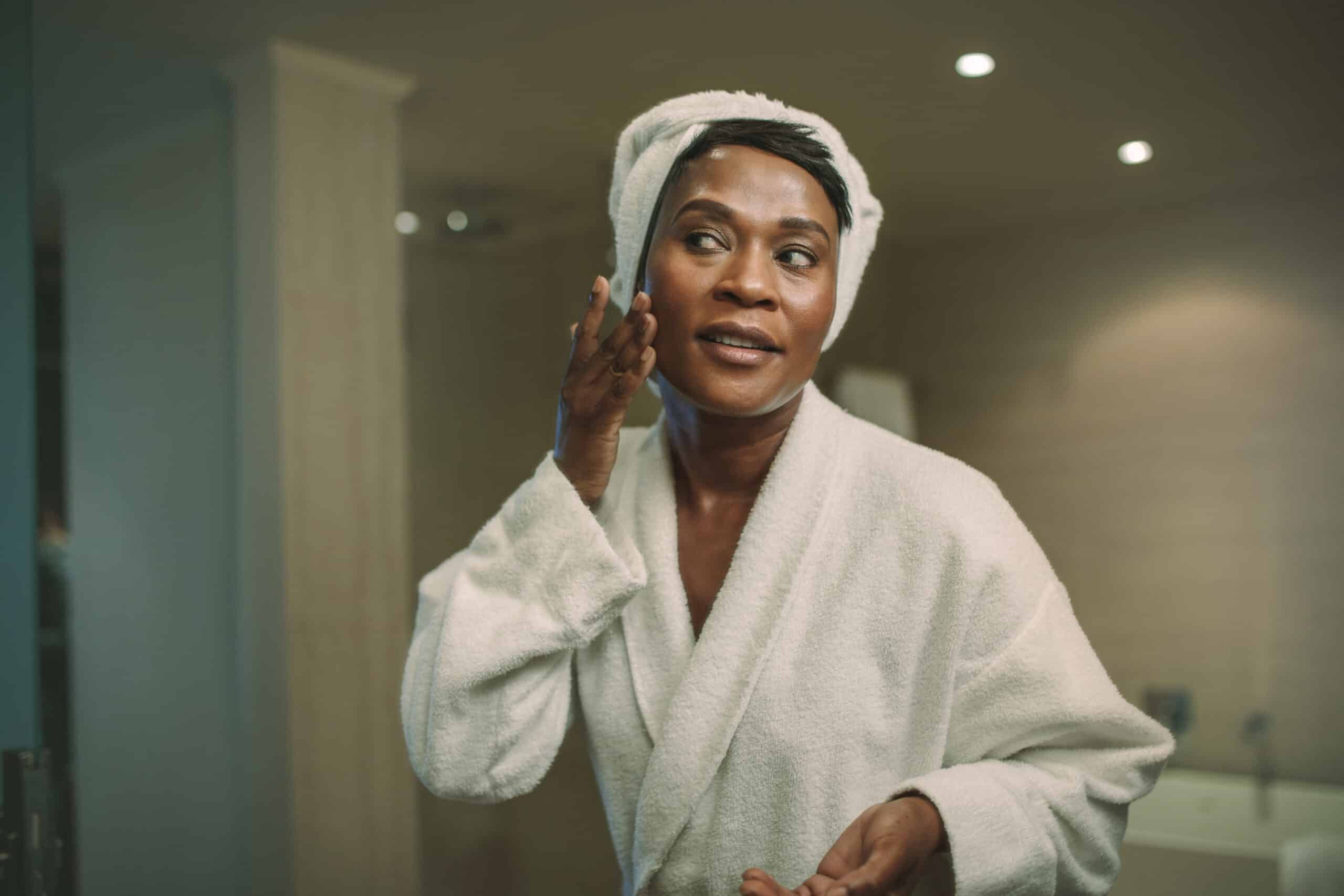 Woman applying skincare